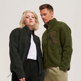 Unisex sherpa jacket worn by man and woman