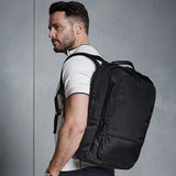 Backpack on left shoulder